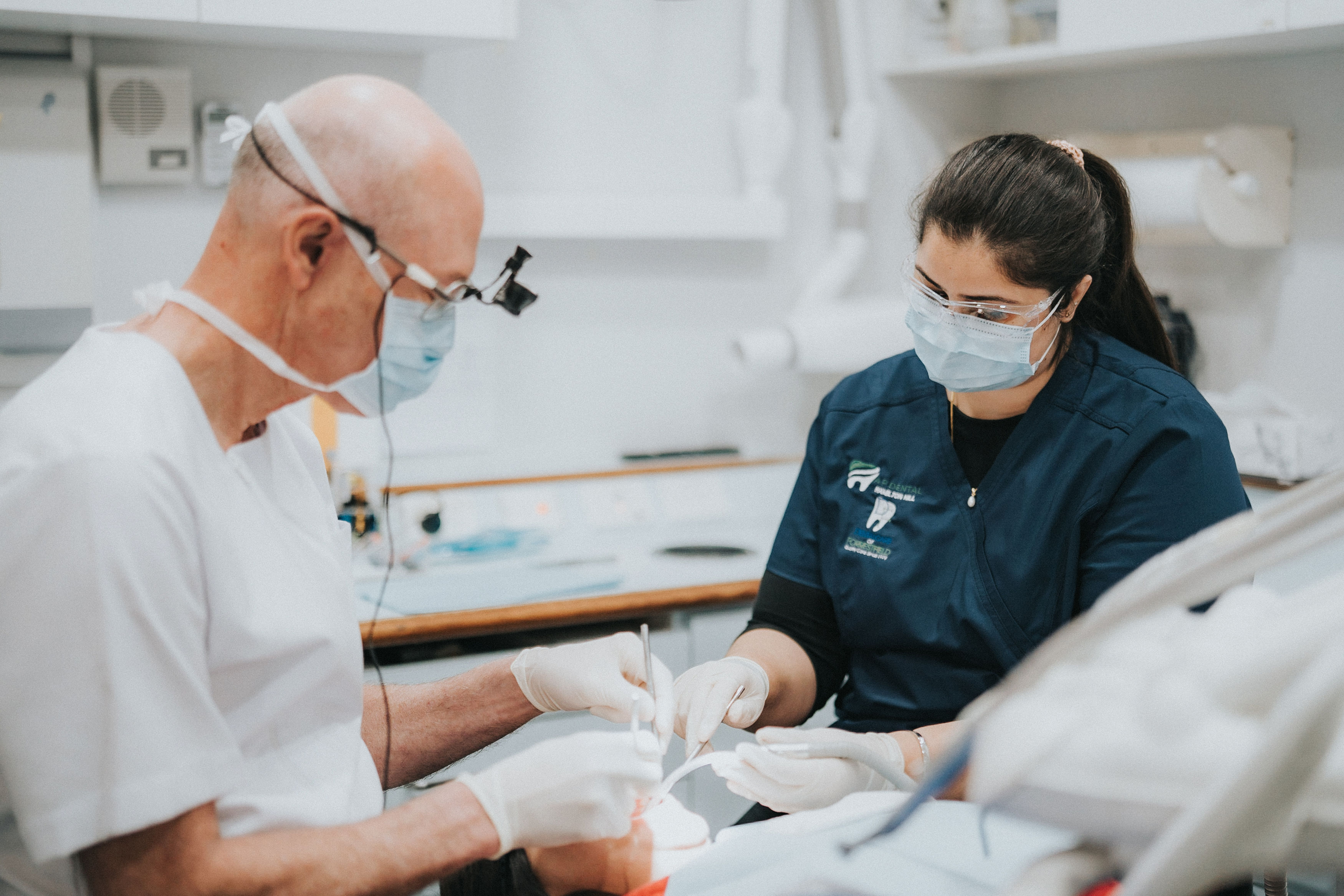 Dental team explaining urgent dental care next steps